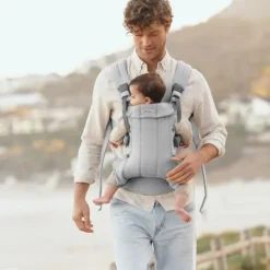 BabyBjörn Harmony Draagzak – Geweven – Mélange Lichtbeige><noscript><img width=